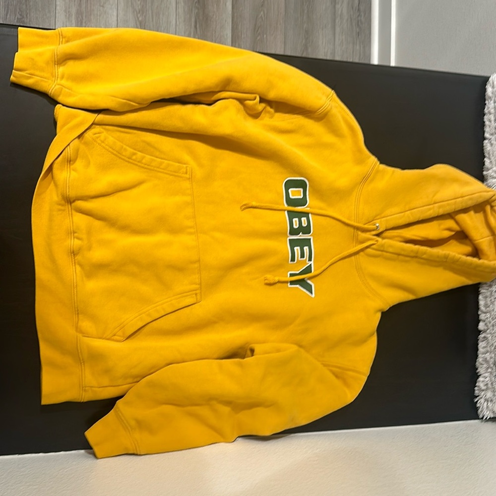 yellow and green obey hoodie, size medium.